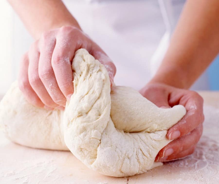 Work the dough by hand