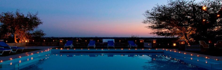 Desert Resort Mandawa swimming pool in the evening