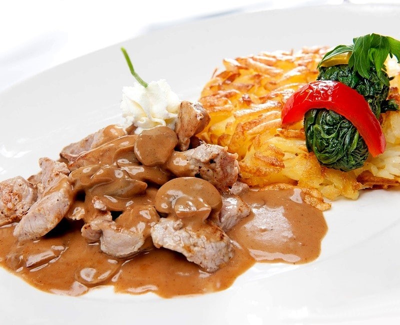 Émincé de veau aux champignons et rösti