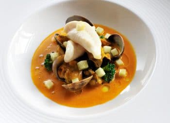 Filet de Saint-pierre en nage de coquillages